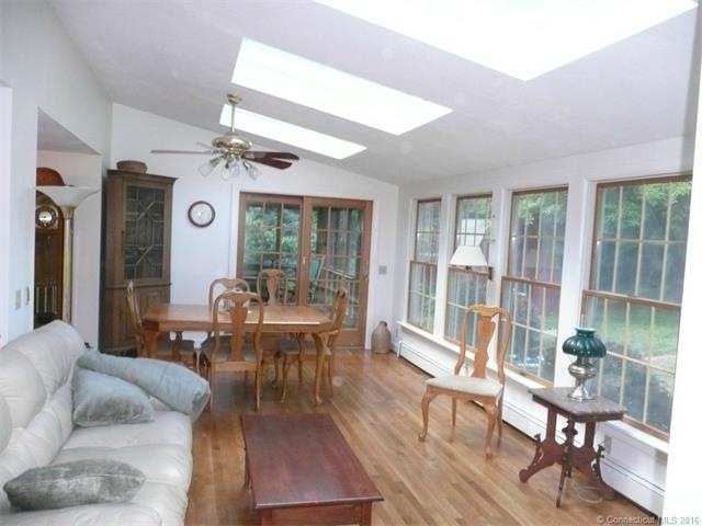 Combination family room with dining area. Skylight