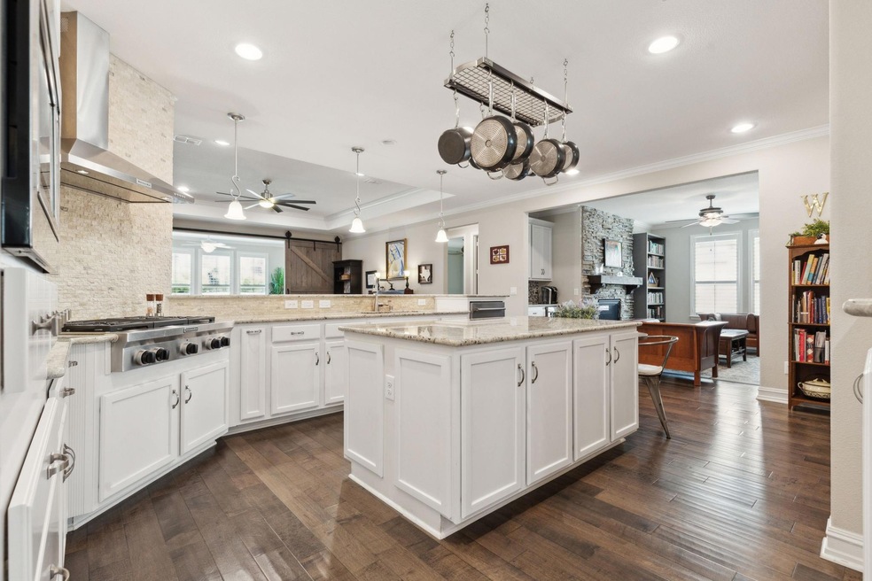 Upgraded gourmet kitchen with expansive countertop