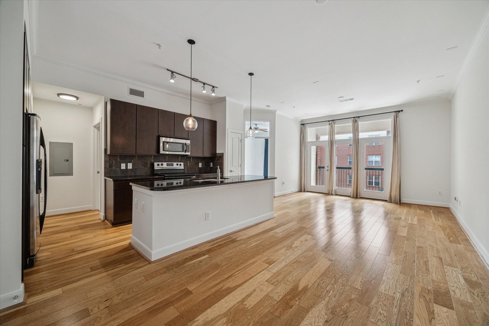 Open floorplan with double pane French doors newly