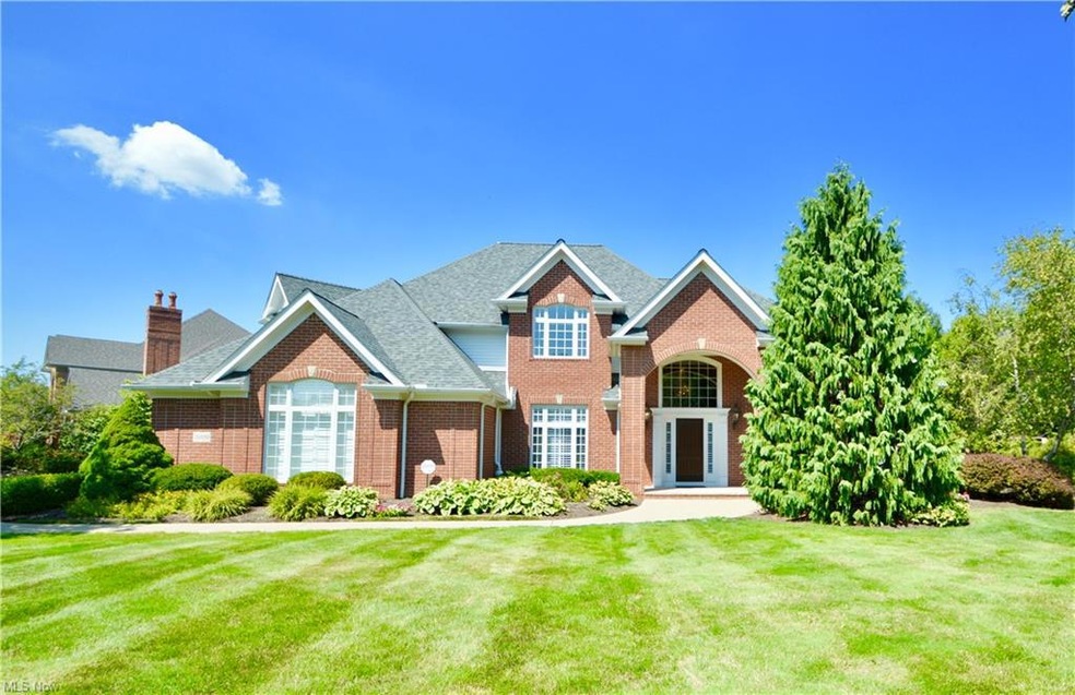 Welcome to 31050 Lands End Lane, a stately all-bri