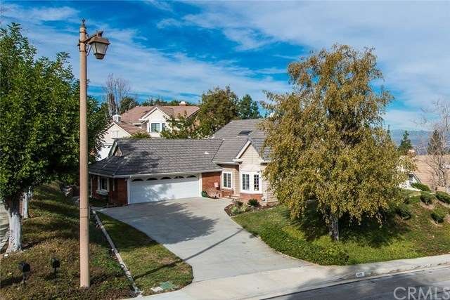 Meticulous upkeep on the landscaped front yard and