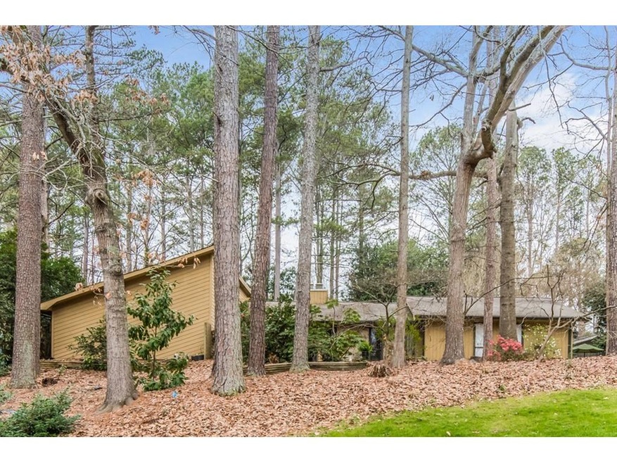 INDIAN HILLS FEATURES THIS FOUR BEDROOM RANCH
