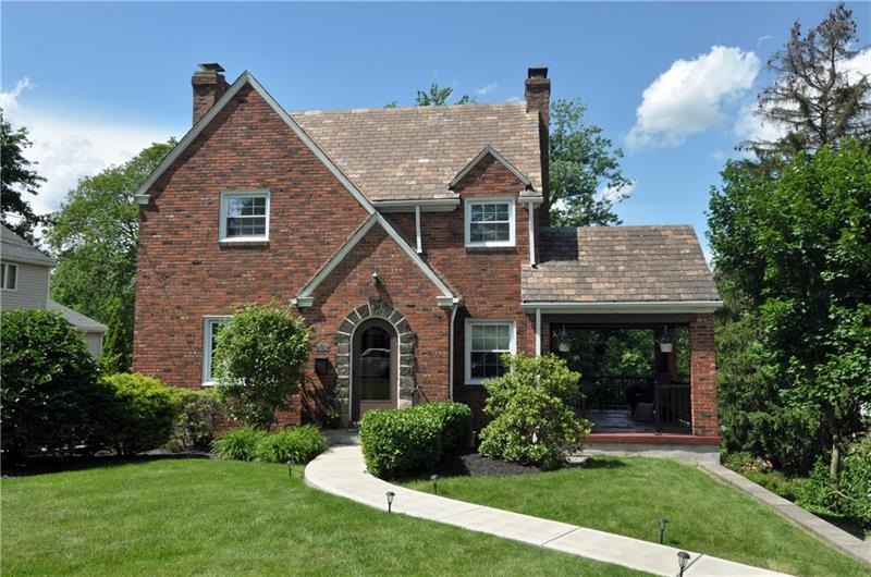 Beautifully landscaped, with a large front and bac