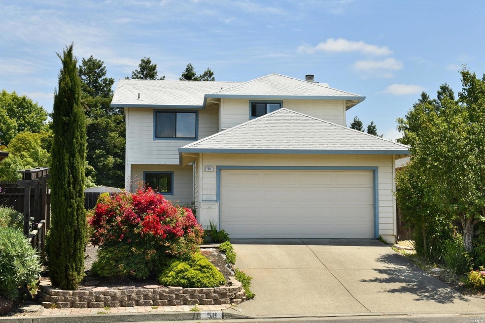 South facing, front elevation. Beautiful asian pear, right of the driveway!