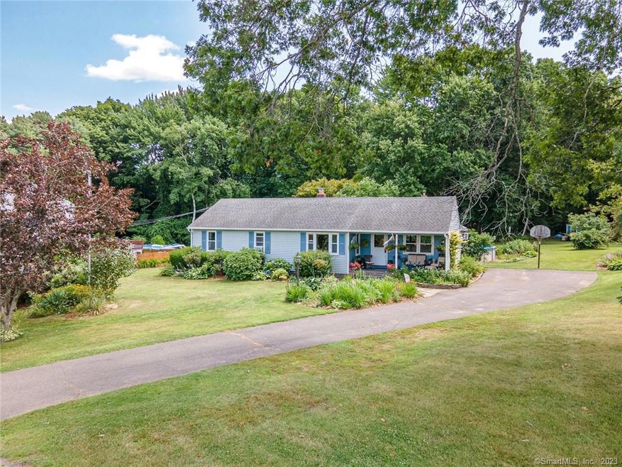 Front exterior, house is nicely set back from the 