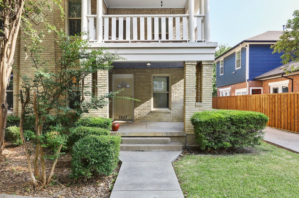 Entrance to property with brick siding