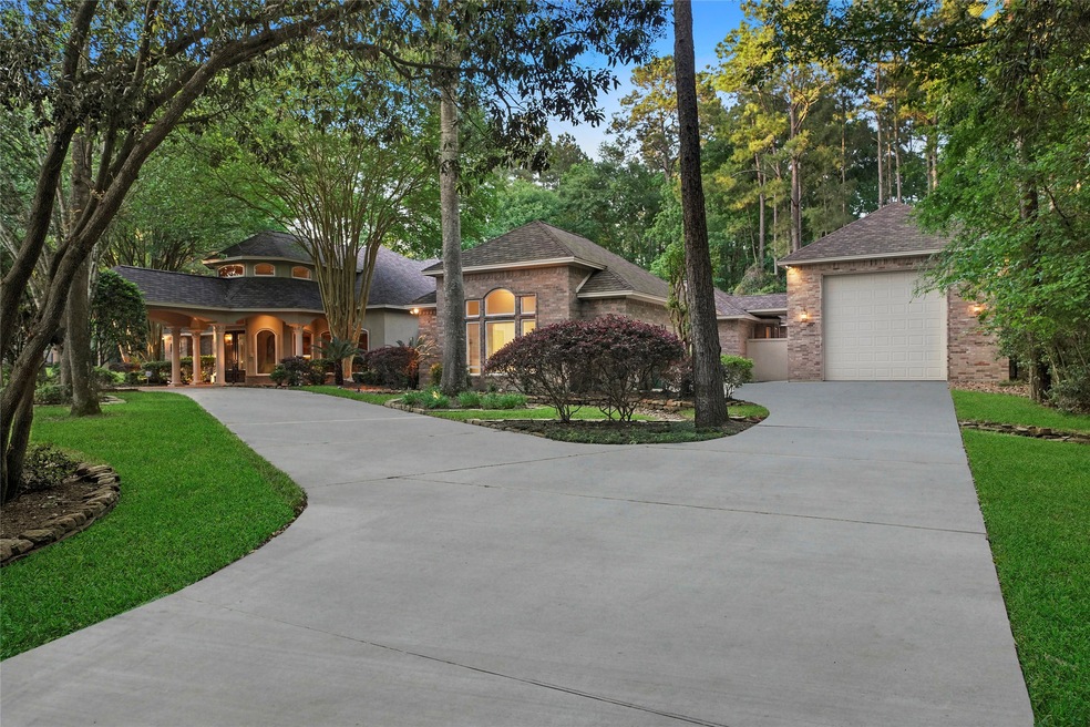 Circle drive, 3 car garage and additional RV garage/shop