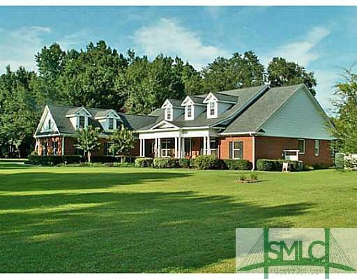 Exterior Front. Beautiful landscaped gardens