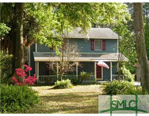 Exterior Front. Swing on Front Porch stays