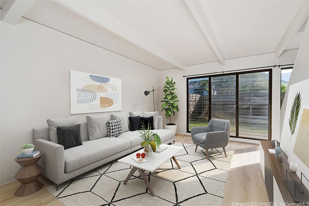 Enhanced virtual staging. New flooring and paint.