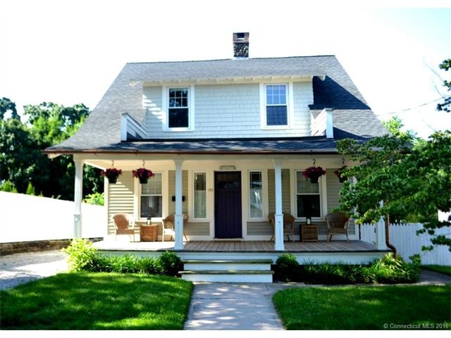 You're welcomed by a charming covered Front Porch