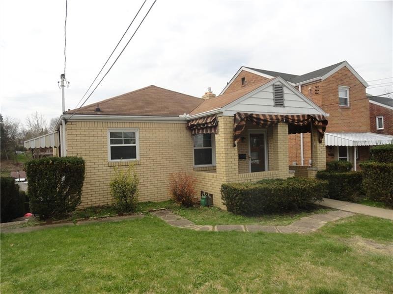 EASY LIVING BRICK RANCH WITH THREE BEDROOMS.