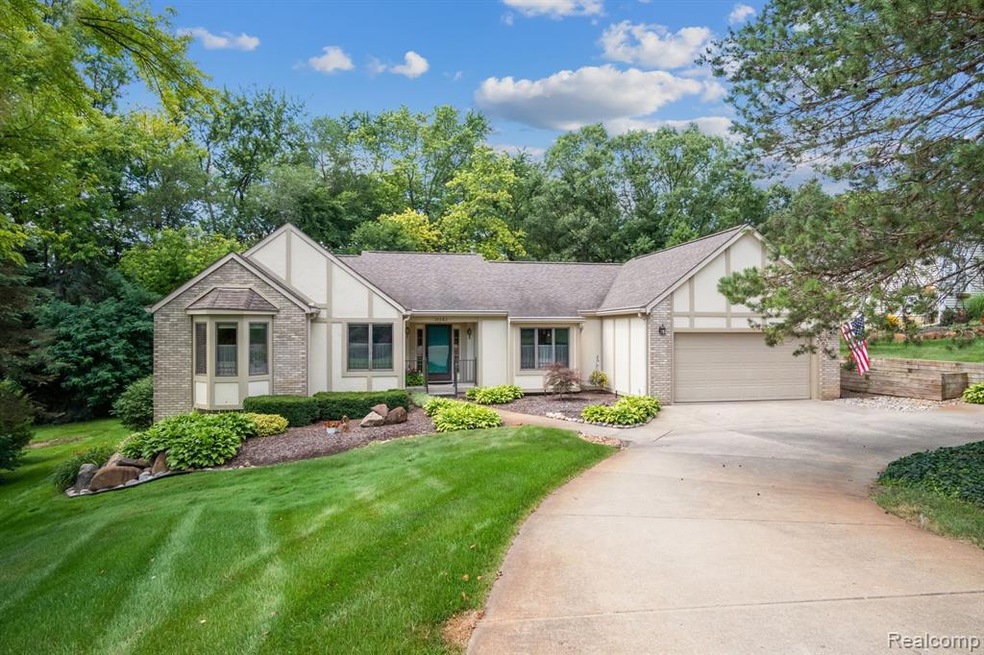 Beautiful setting with a tree lined backyard