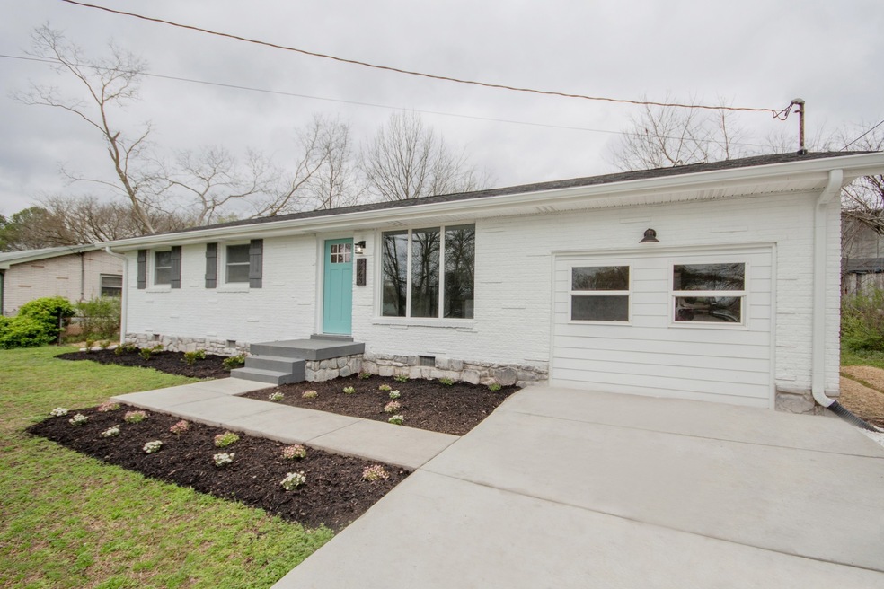newly painted brick with new windows