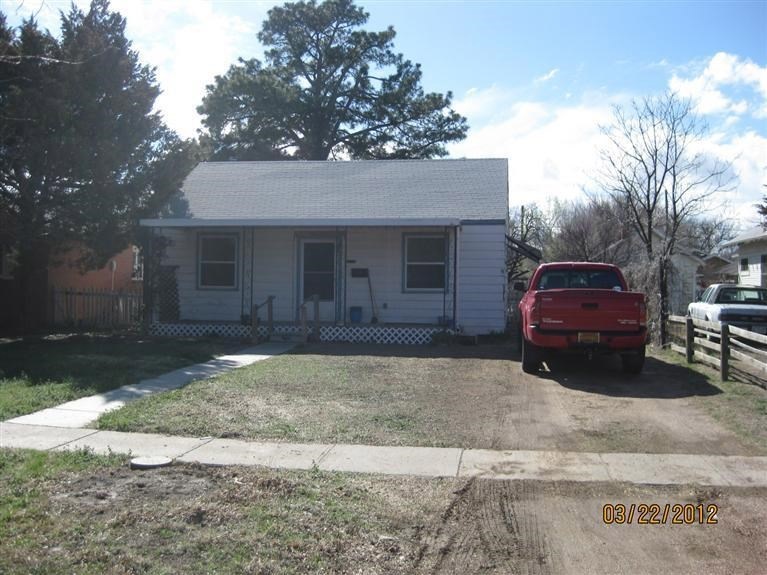 709 S Jackson St, Hugoton, KS 67951 - photo 1