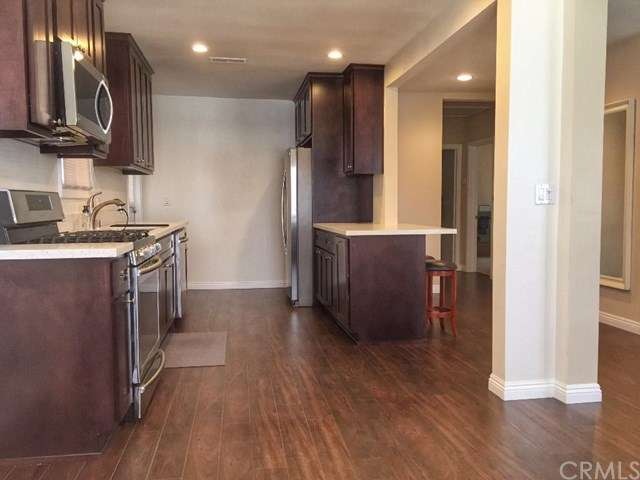 Open kitchen with recessed lighting