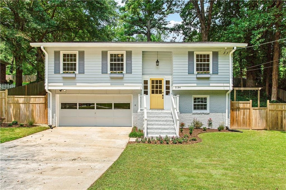BEAUTIFUL FOUR BEDROOM HOME JUST TWO MINUTES FROM 