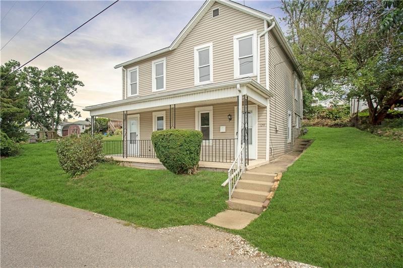 EXTERIOR FRONT - Welcome to 129 Bluff Street.  Att