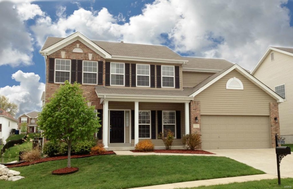 Beautiful elevation with some brick and upgraded l