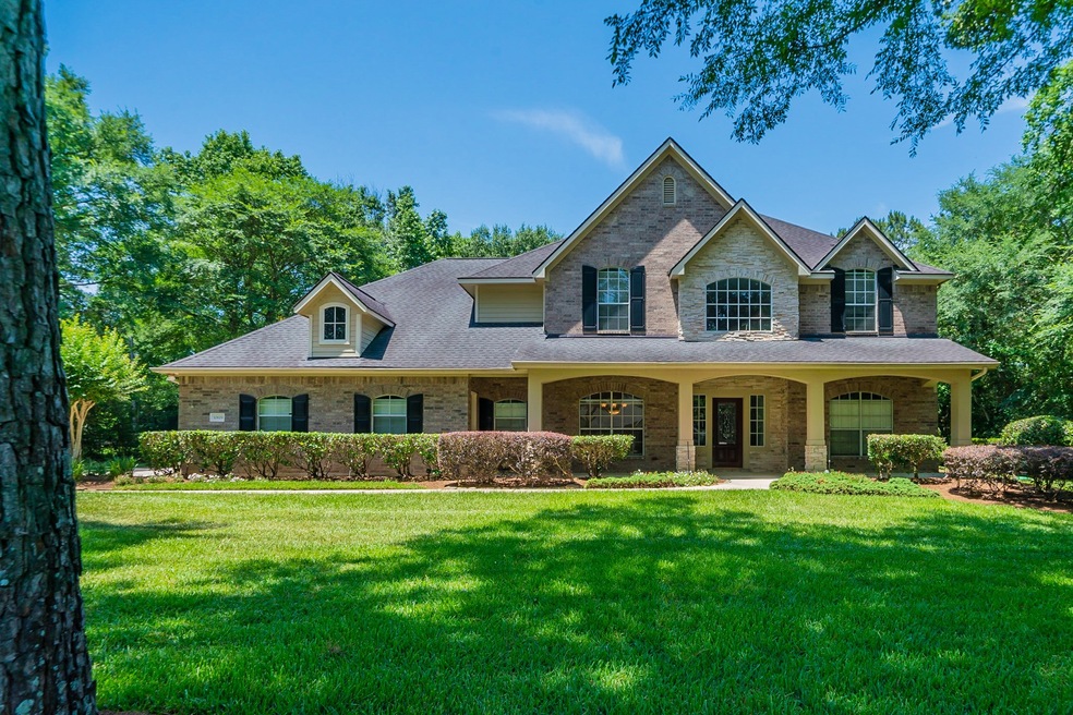 10619 Clubhouse Cir, Magnolia, TX 77354 - photo 1