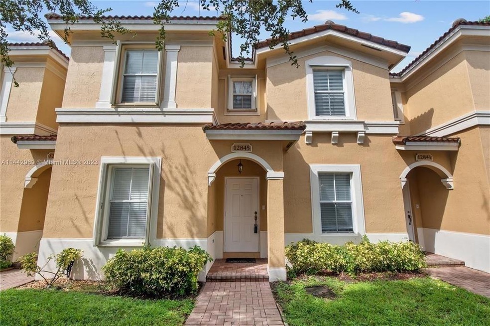 12845 SW 30th St unit 103, Miramar, FL 33027 - photo 1