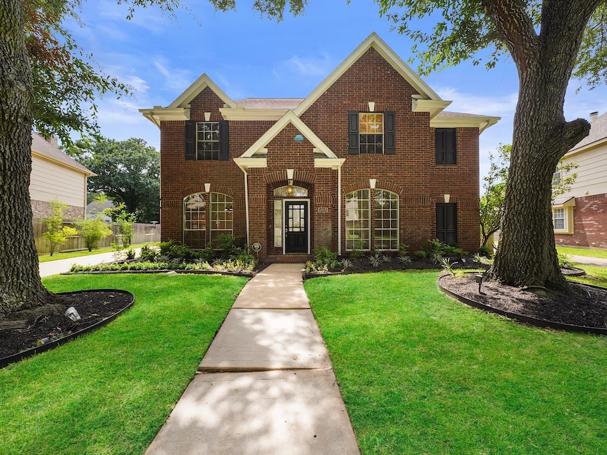 This beautifully updated 2,979 sq ft brick home of