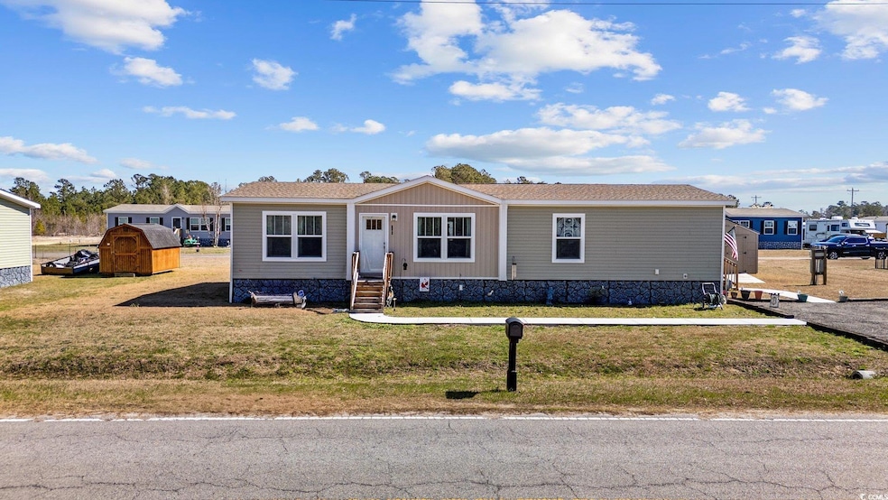 Manufactured / mobile home featuring entry steps, 