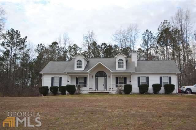 BEAUTIFUL HOME WITH ROCKING CHAIR FRONT PORCH ON 5