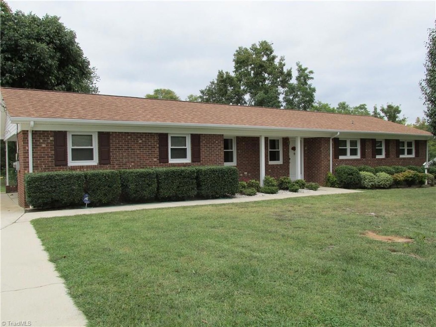 Beautiful brick ranch on .71 acres.