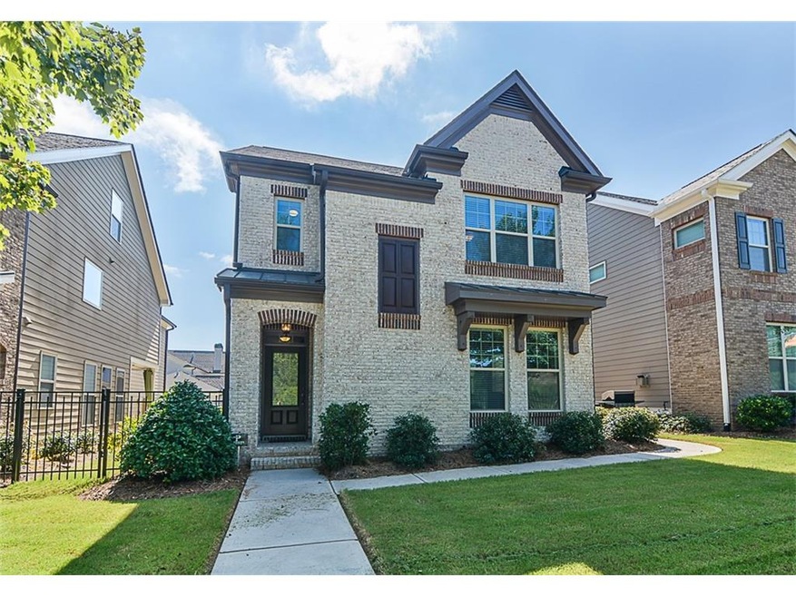 Adorable brick front home. Larger than it looks!