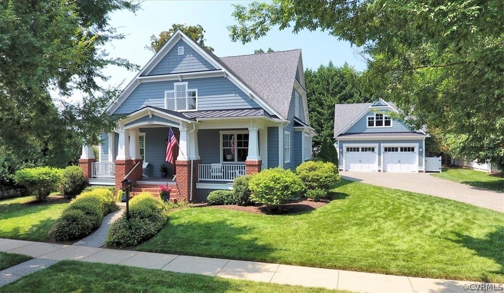 Distinctive Craftsman Elevation with Carriage Styl