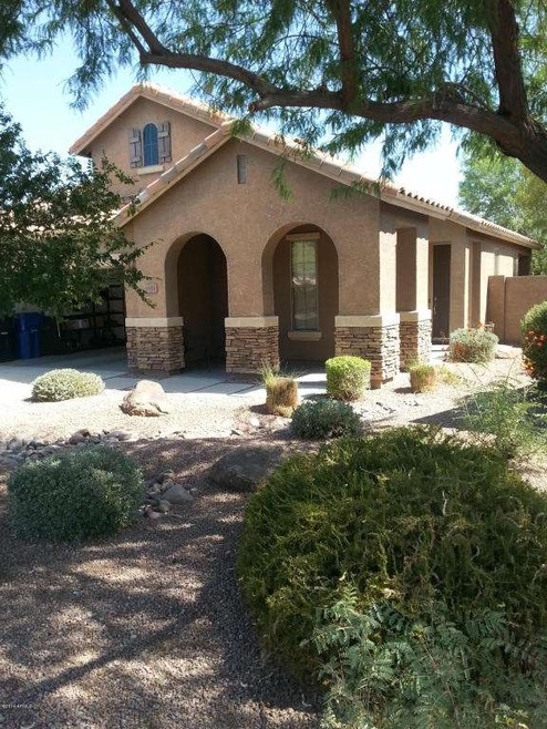 Jean Meyer front of home