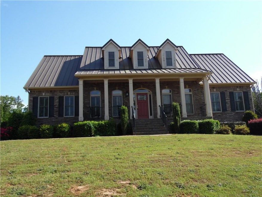 4 sided brick home has all those earth tones that 