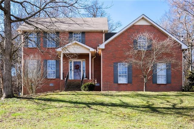 Beautiful and private, 405 Cobblestone Ct is warm and welcoming! Attached 2 car garage on the right.