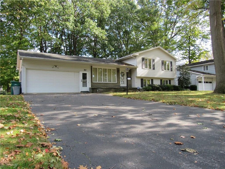 welcome to 50 Lida Lane. Double wide drive and 2 c