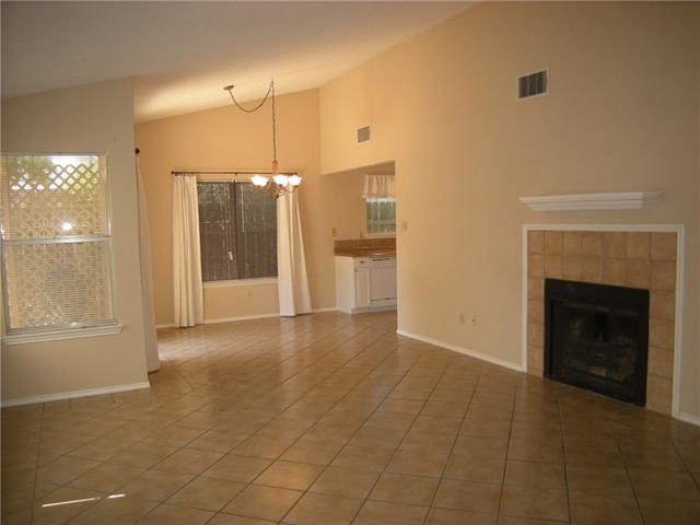 the vaulted ceiling makes the open floor plan feel