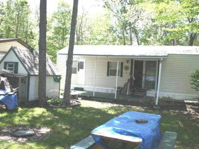 57 Cedar Shores Dr, Hayes Township, MI 48625 - photo 1