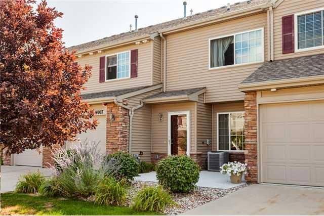Exterior Front. Private entry, patio & garage!