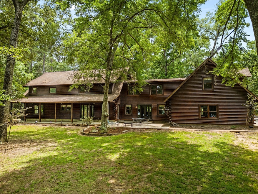 Expansive backyard and back view of the home nestl