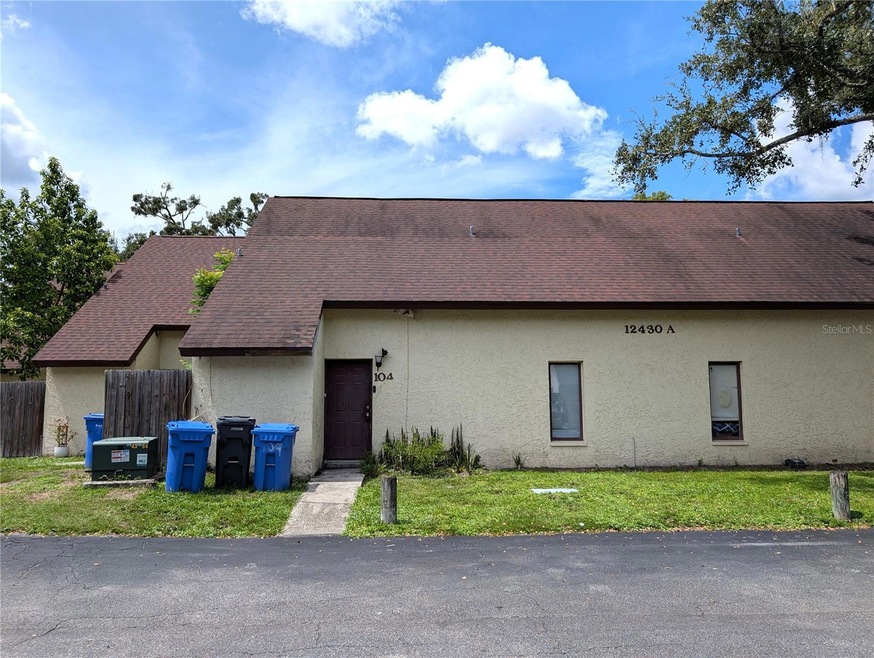 12430 Touchton Dr unit 104, Tampa, FL 33617 - photo 1
