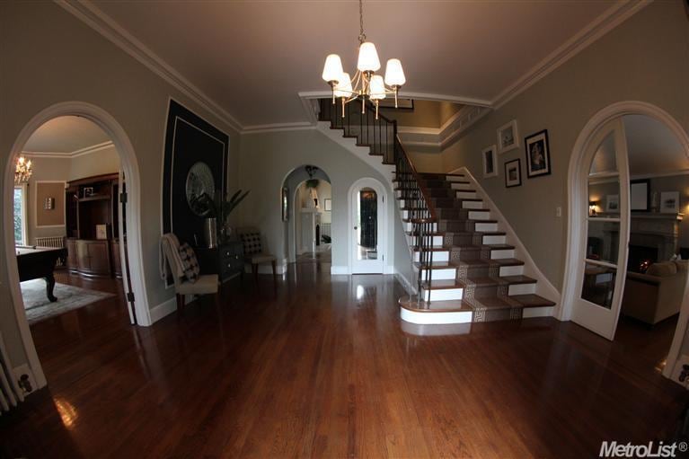 Welcome home to a spacious dramatic entry with acc