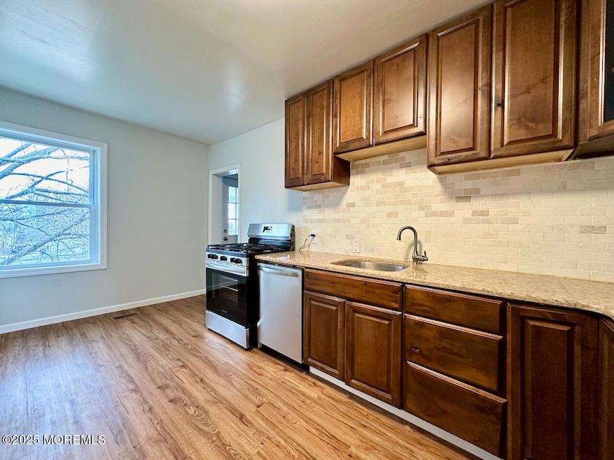 1219 11th Ave unit A, Neptune, NJ 07753 - photo 1