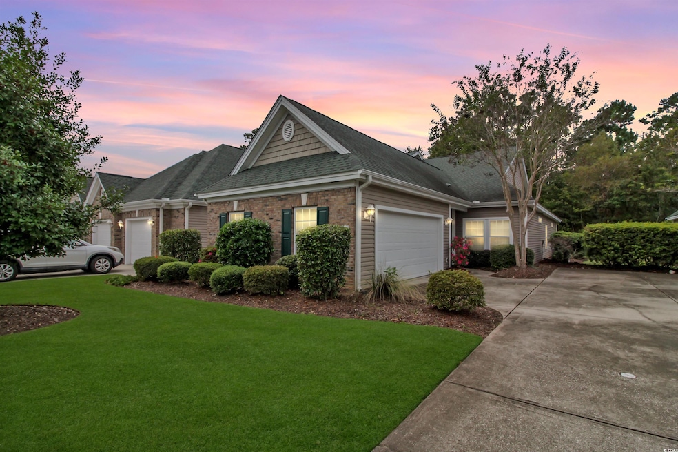 Single story home with roof with shingles, brick siding, a front yard, concrete driveway, and an attached garage