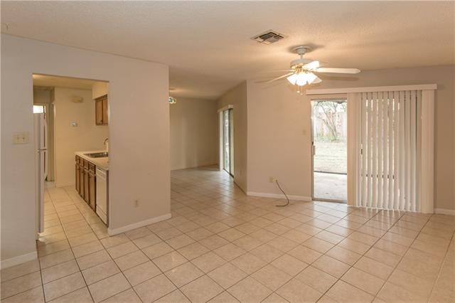 Entry view: two sliding glass doors to back yard a
