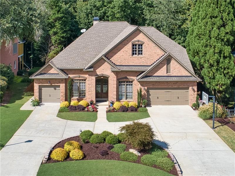 Pristine 3 Sides Brick Ranch Home with 3 Car Garag