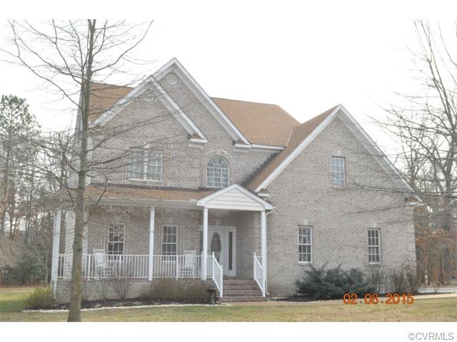 Brick front and 3 side vinyl siding home on great 