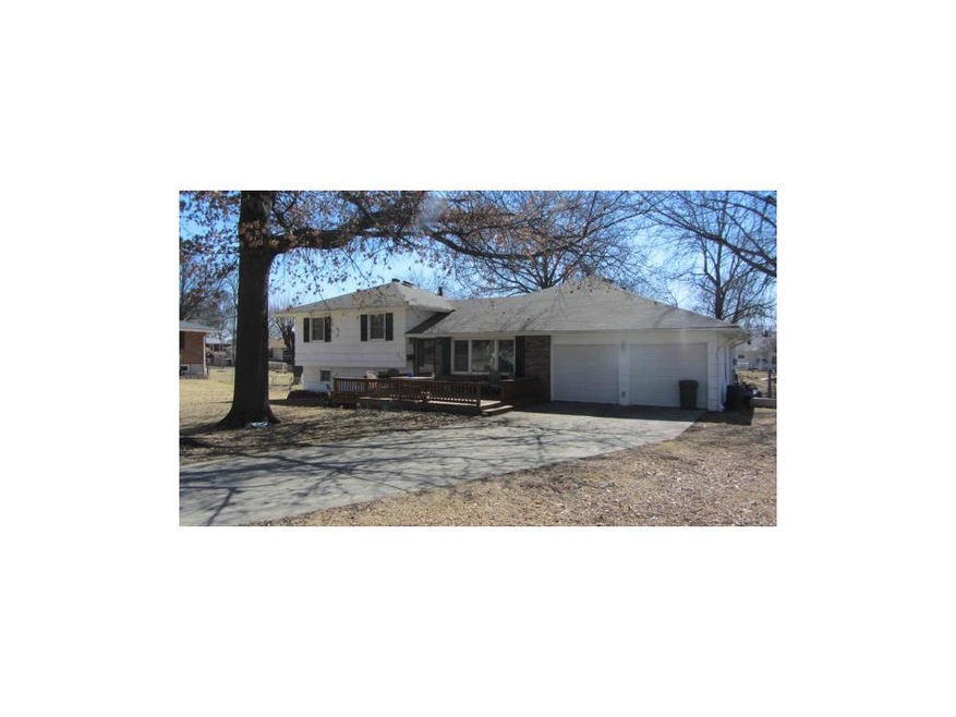 Front elevation w/entry deck and 2 car garage