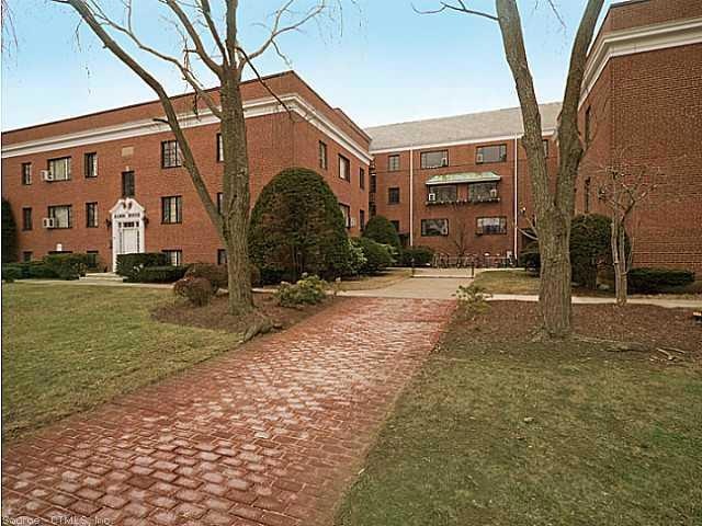 Exterior Front. Attractive brick building set back