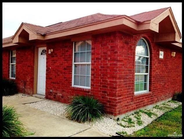 View of front facade with brick siding
