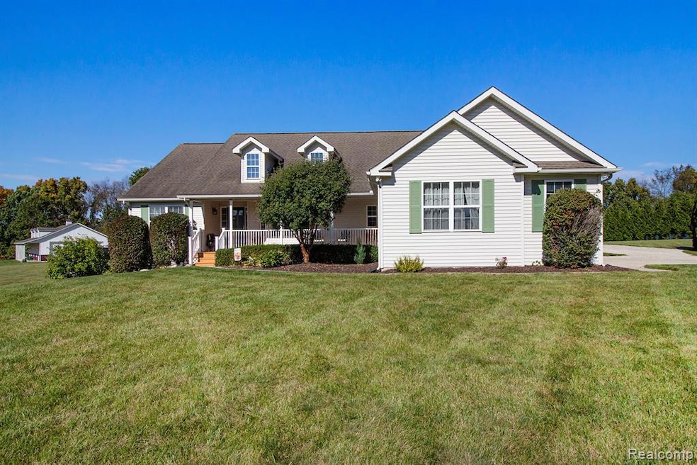 703 N Hughes Rd, Howell, MI 48843 - photo 1